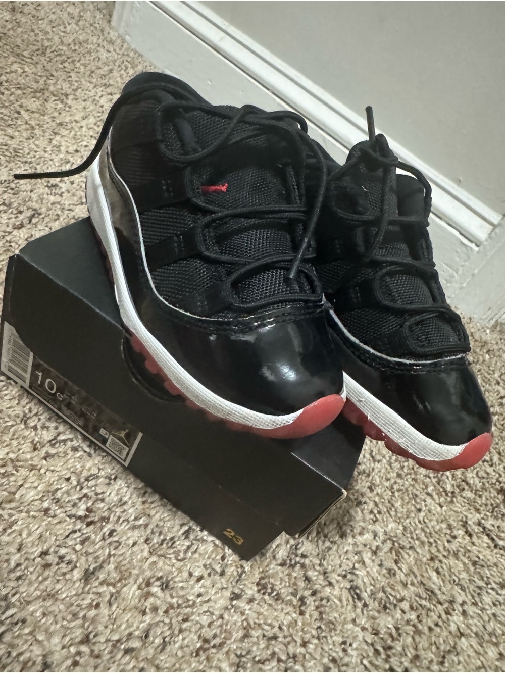 Jordan Kids Black and Red Retro Low-Top Sneakers